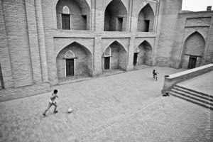 Kids in walled cities don't have many options for football pitches. These doors will do. (they were later chased away by a frightful witch of a woman)