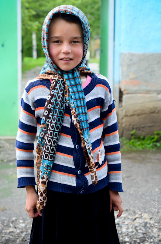 This girl, probably about 11 years old, watched over her younger neighbours. Most women around here were camera-shy and even hostile towards travellers - but she let me take a photo.