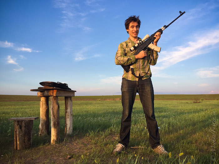 Myke with a Kalashnikov in Russia