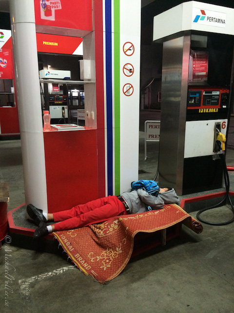sleeping pertamina petrol station attendant